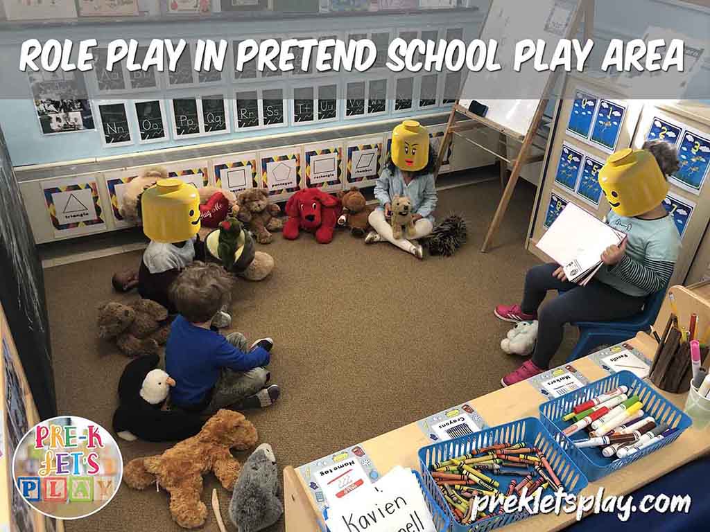 Kids teaching preschool and having circle time for pretend school play.