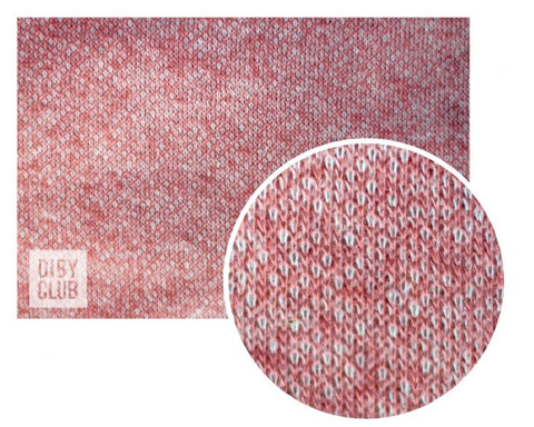 Photo of a knit fabric with a close up of the grain.