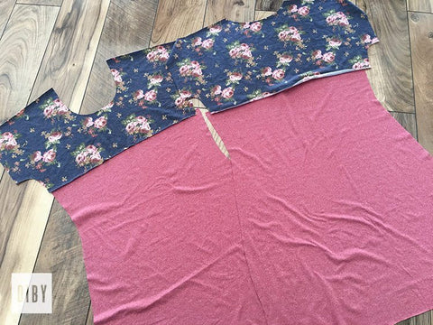 Cut fabric pieces lined up with fabric pieces wrong side up.