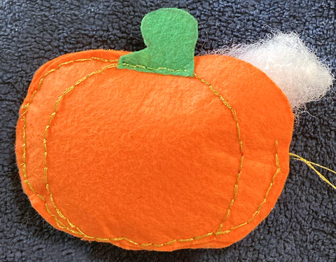 Stuffing pumpkin image for Halloween felt garland