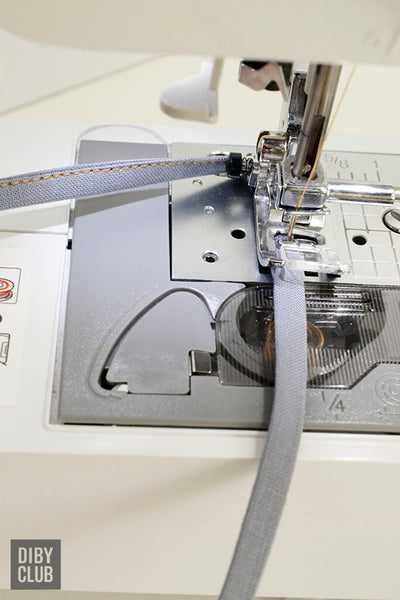 Sewing drawstring with sewing machine