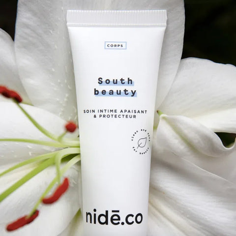 Intimate gel tube soothes and protects against vaginal dryness South beauty from Nidéco in a flower