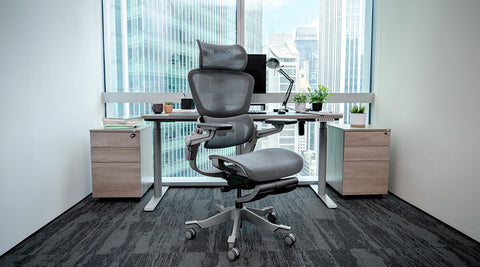 H1 Pro Ergonomic chair in an office space with a city view