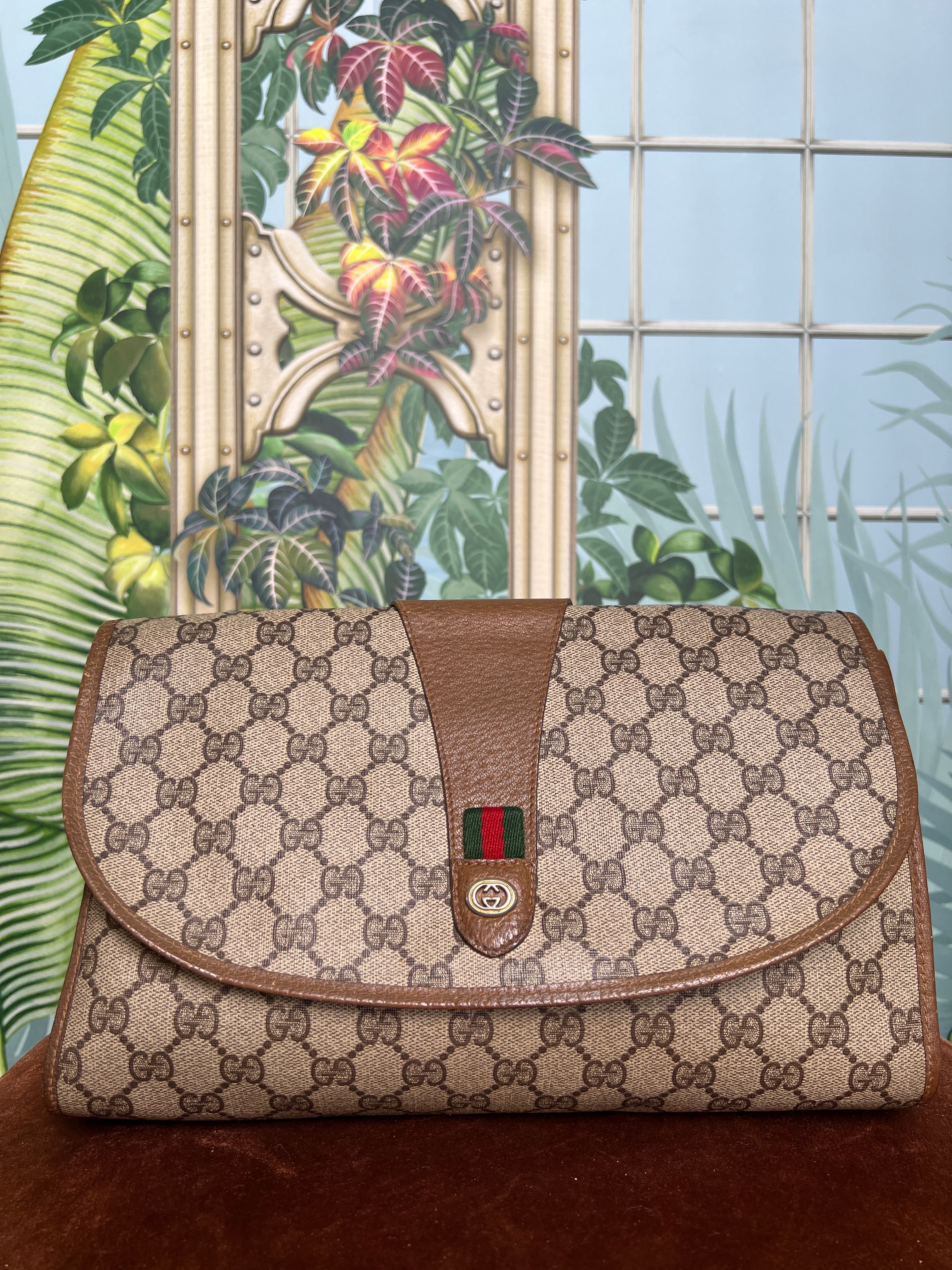 image of Gucci GG supreme sherry line clutch bag