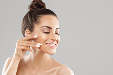 charming-relaxed-gentle-young-woman-making-cosmetological-procedure-applying-facial-cream-face-with-fingers-smiling-broadly-feeling-perfect-taking-care-skin_176420-24010__PID:79e2f624-b50a-43ab-b72d-9e499b50de70