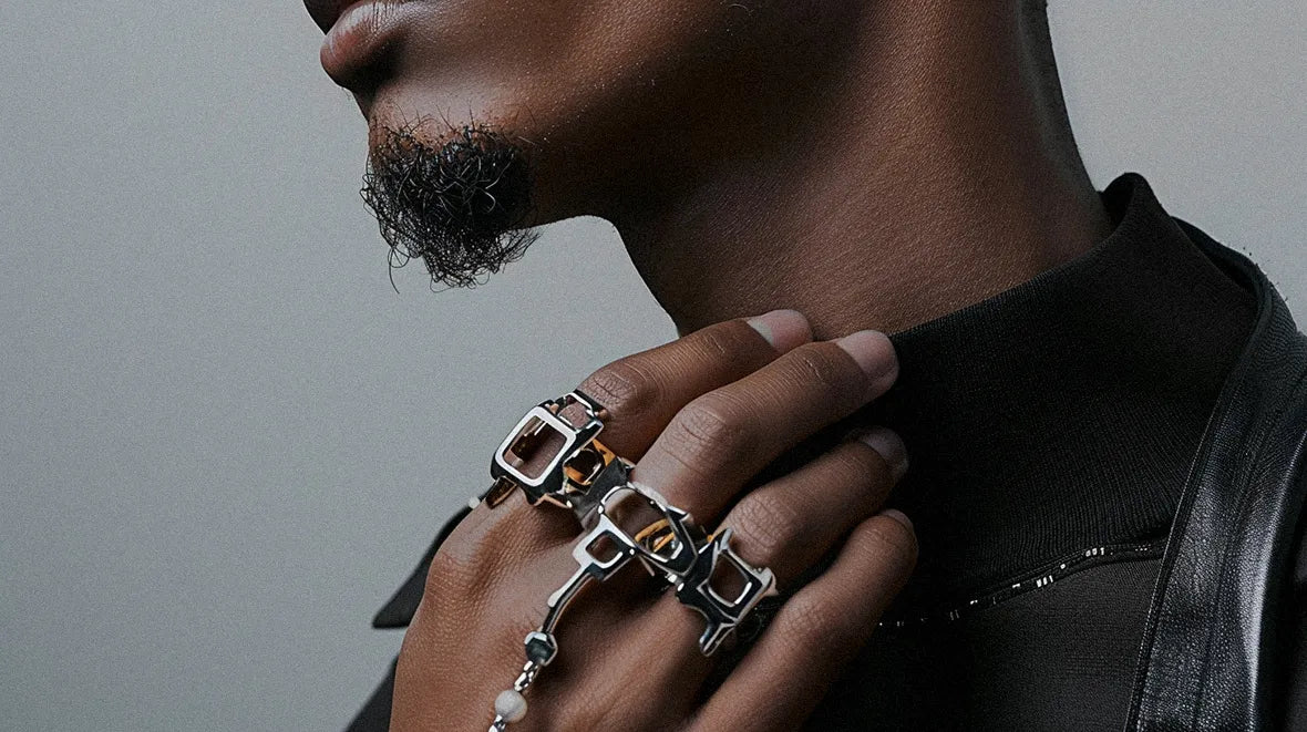 black man wearing cyberpunk jewelry