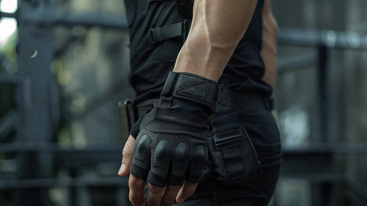 a new pair of black techwear fingerless gloves