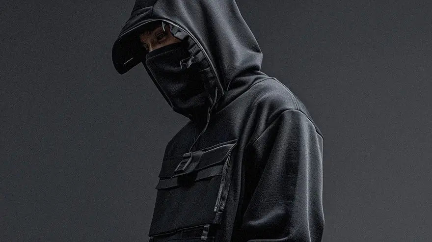 man in techwear hoodie