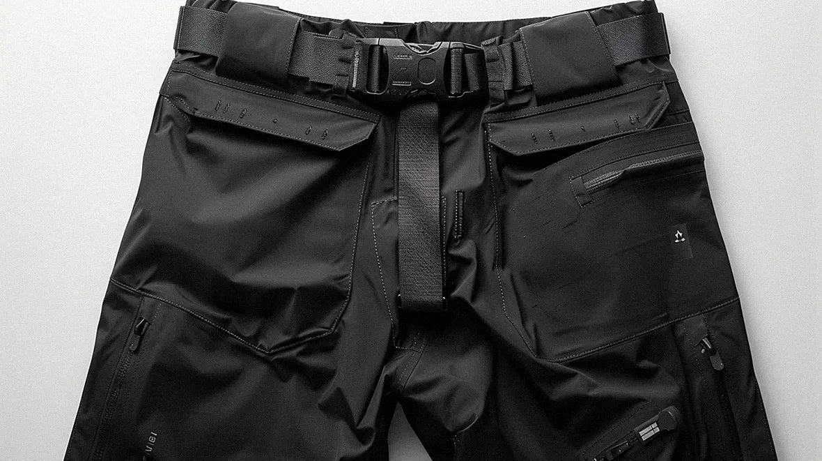 a black pants with a tactical belt