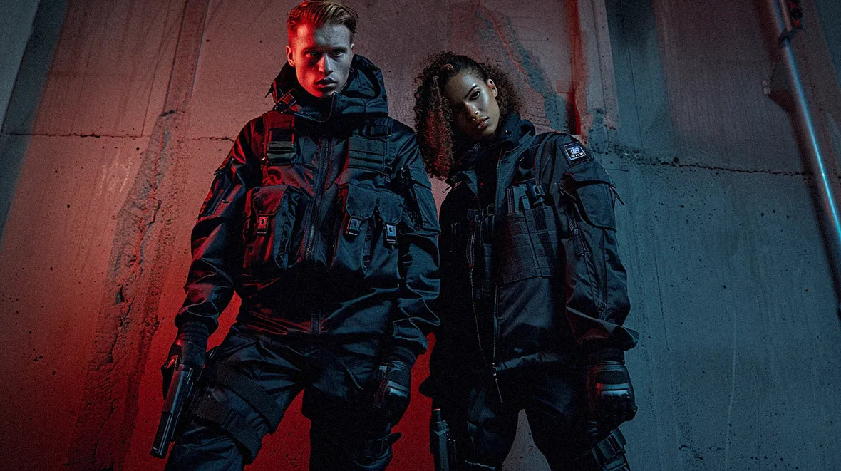 a man and a woman wearing warcore clothing