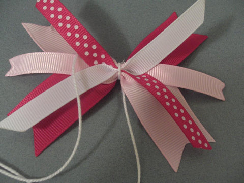 Make a funky loopy bow with grosgrain ribbon