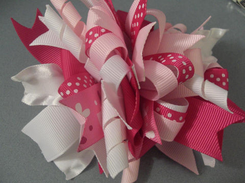 Make a funky loopy bow with grosgrain ribbon