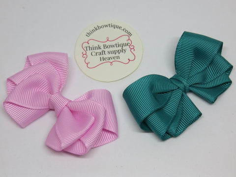 Make a triple layered bow with grosgrain ribbon