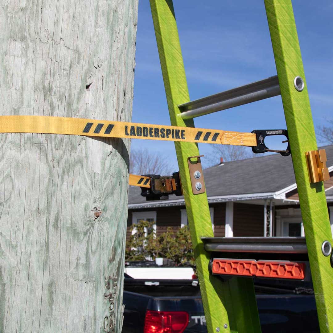 Ladder being stabilized from the top