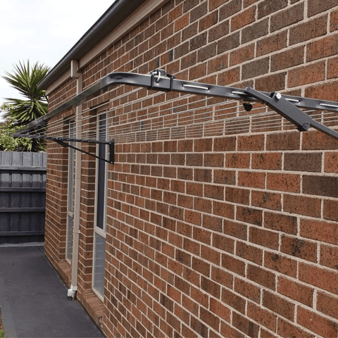 wall mounted folding clothesline installed