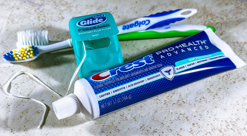 dental floss and tooth paste