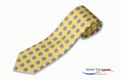 custom-made-logoed-ties-repeated-pattern-scattered-logos-yellow-anne-touraine- 