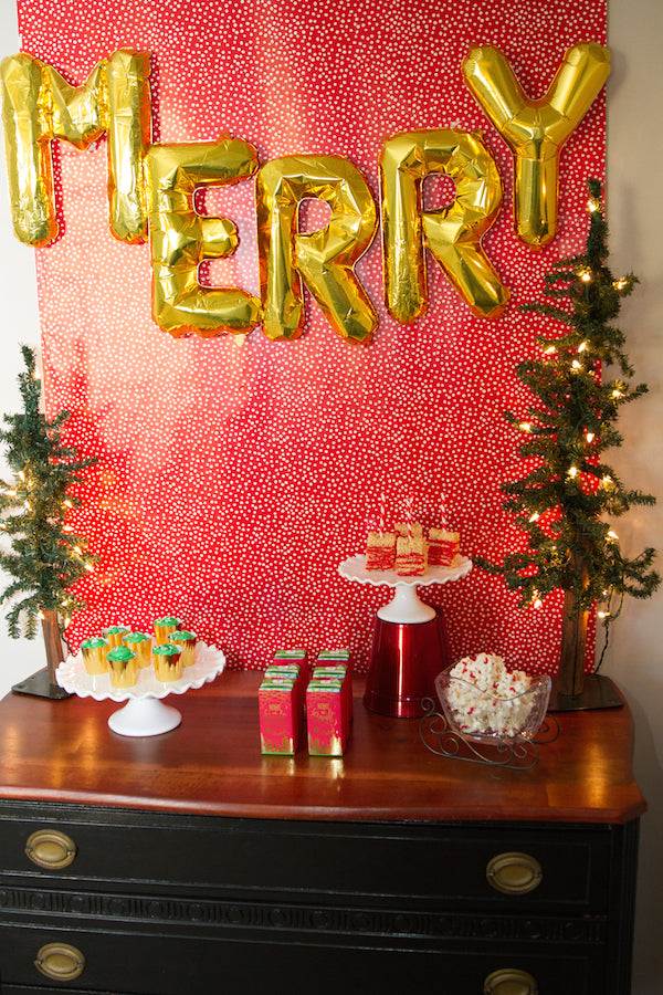 Red and Gold Merry Christmas Dessert Table Shop festive party products now at pinkpoppypartyshoppe.com