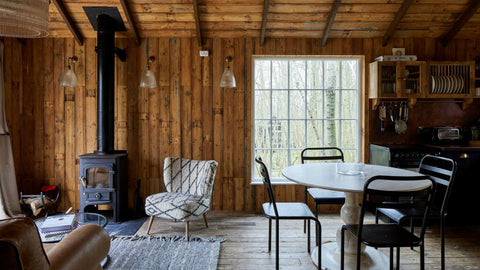 Wooden glad living room in a rustic property renovation