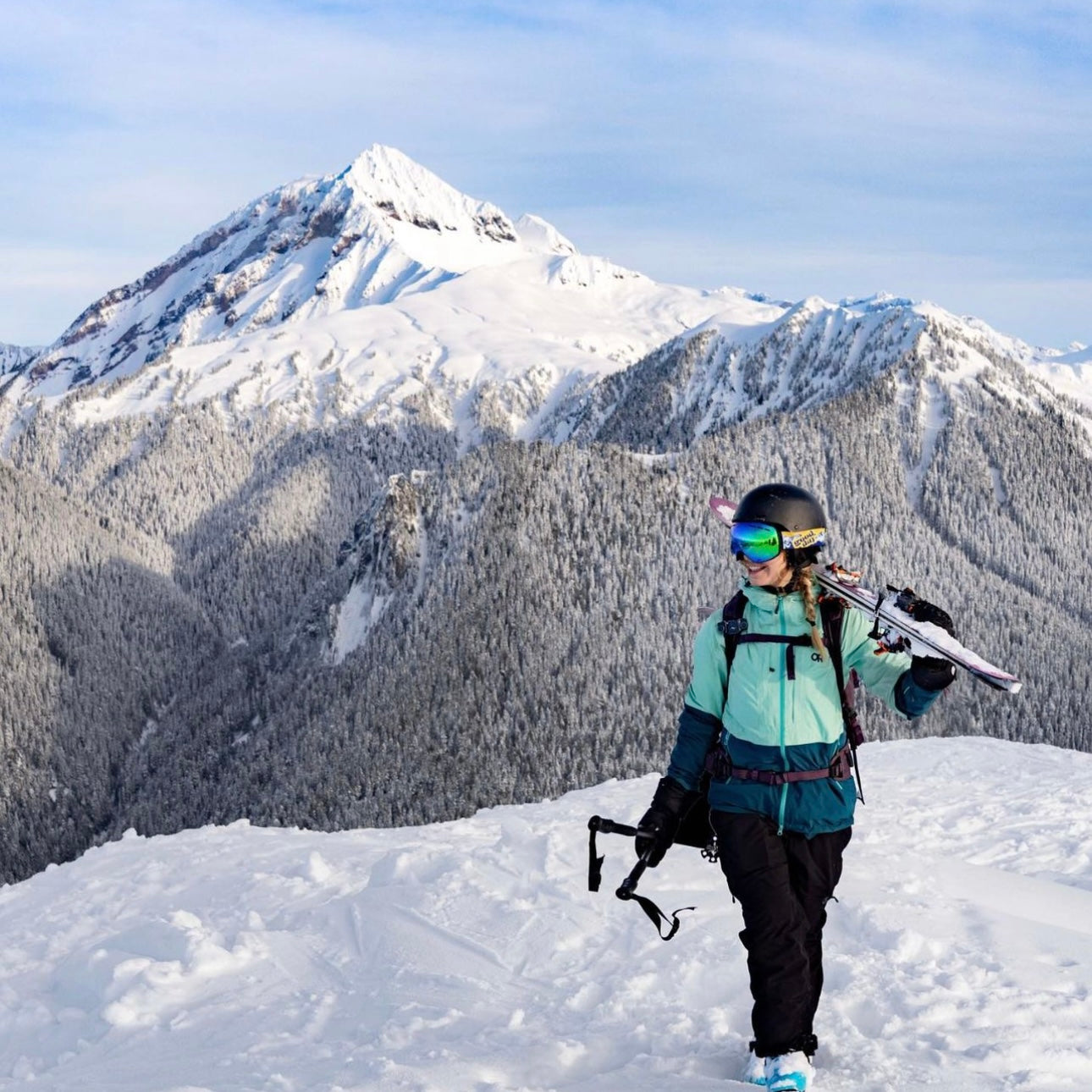 photo of female skier in mountains