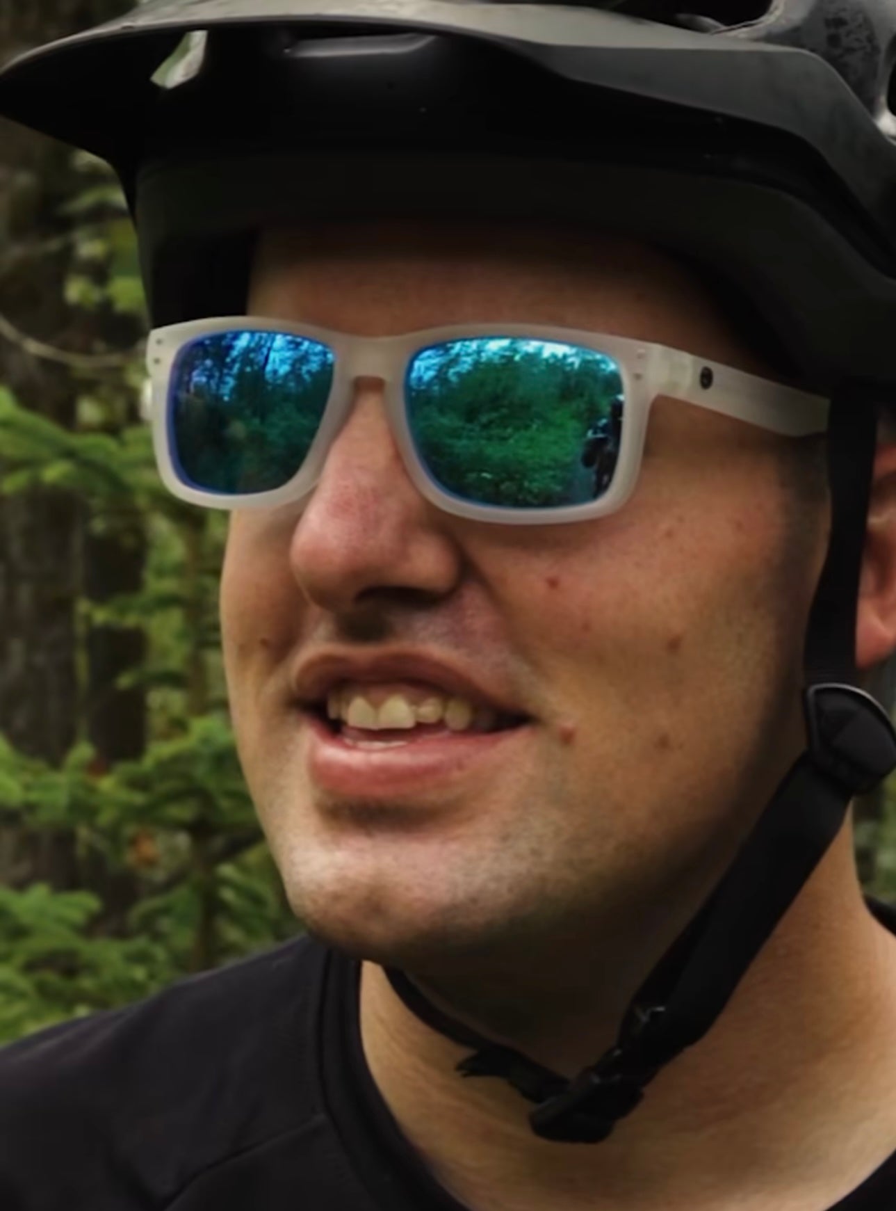 Mountain biker wearing the Melissa sunglasses