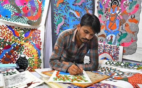 Artist Painting Gond Painting Designs on Canvas