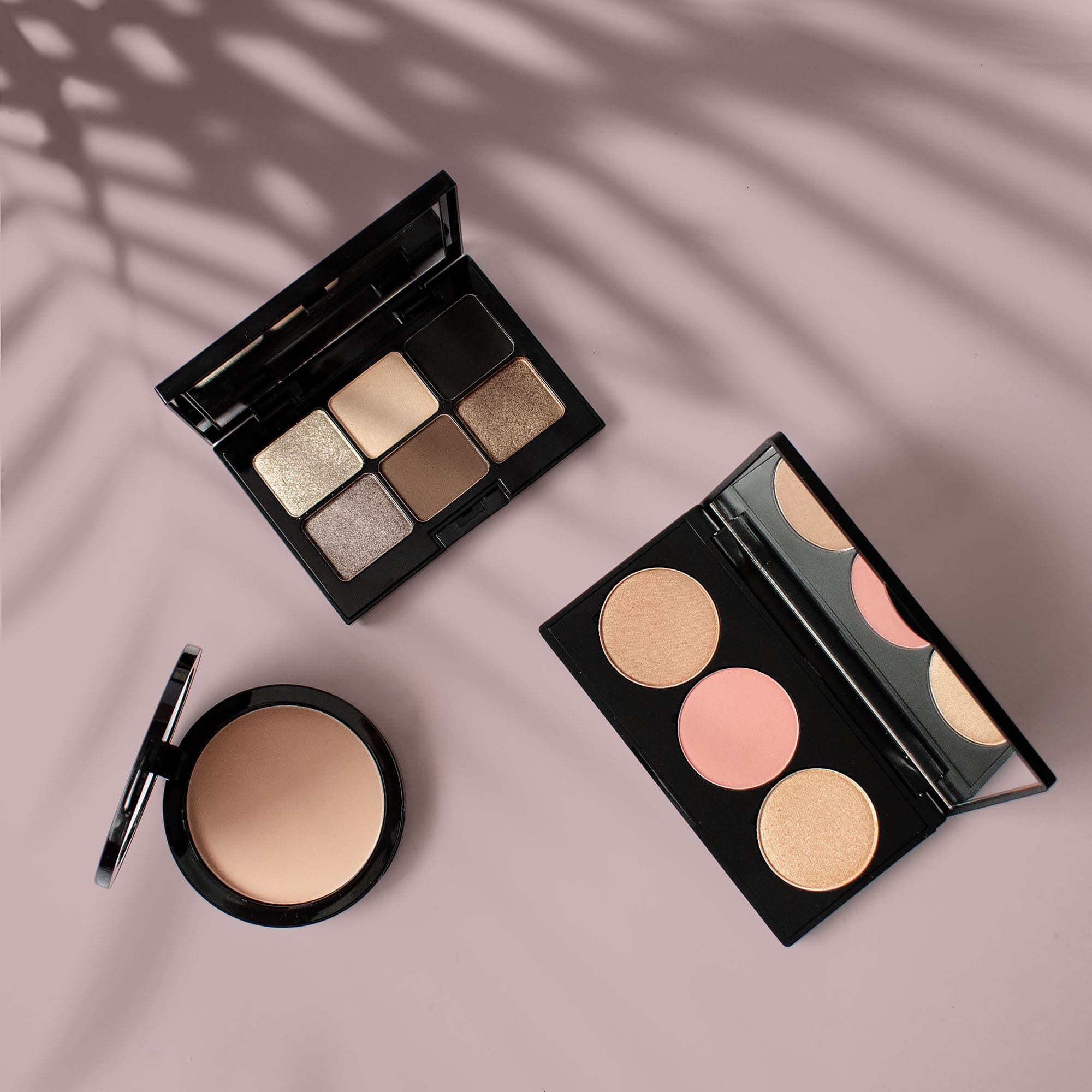 Flat lay of beauty products you brand with your logo. Get started with Blanka today.