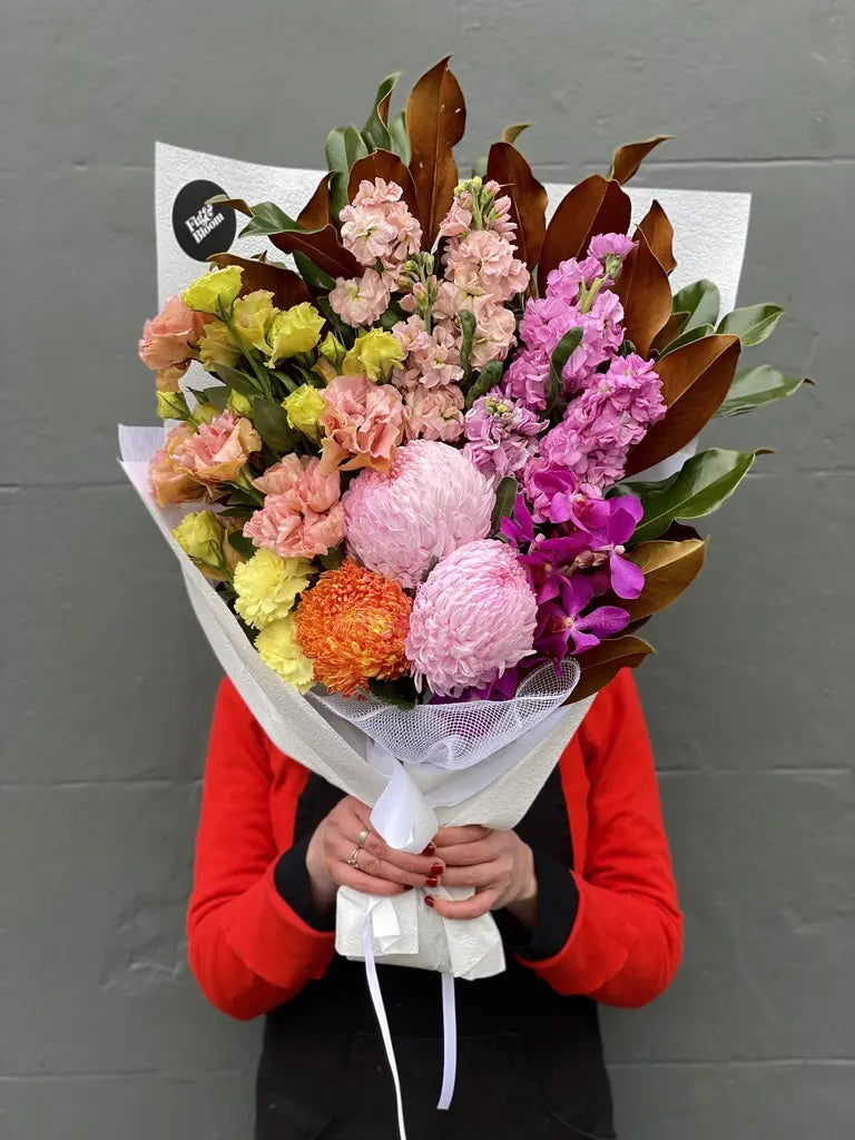 florist holding a bouquet