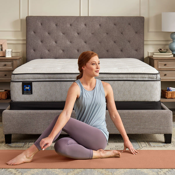 Sealy Clement Soft Pillow top Mattress In Bedroom Woman Stretching