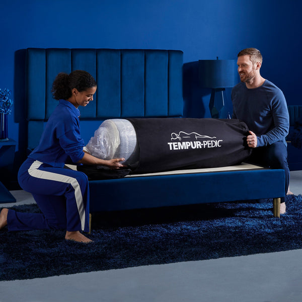 Couple Setting Up Tempur-Cloud Medium Mattress