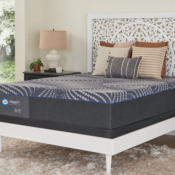 Sealy Brenham Medium Mattress On Bed Frame In Bedroom