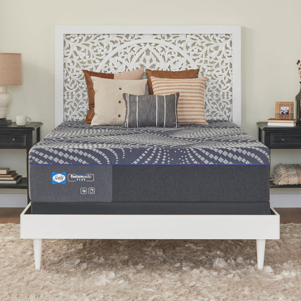 Sealy Brenham Medium Mattress On Bed Frame in Bedroom Front View