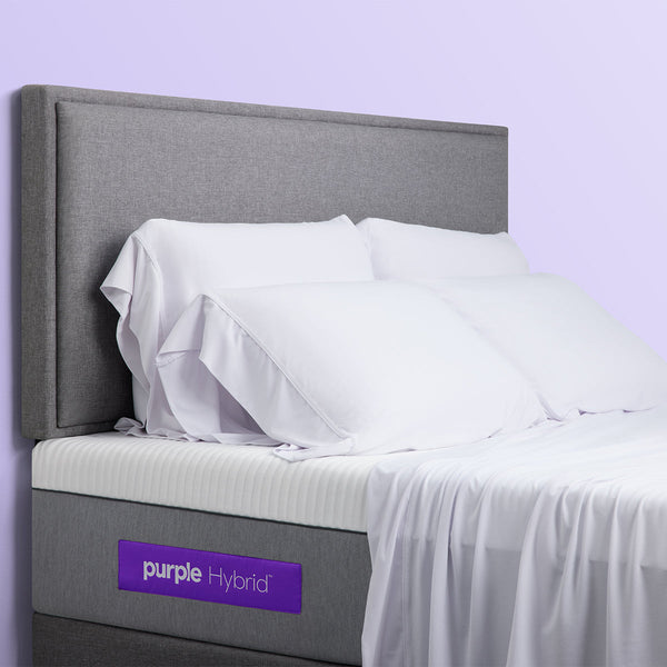 The Purple Hybrid Mattress On Foundation With Pillows And Sheets