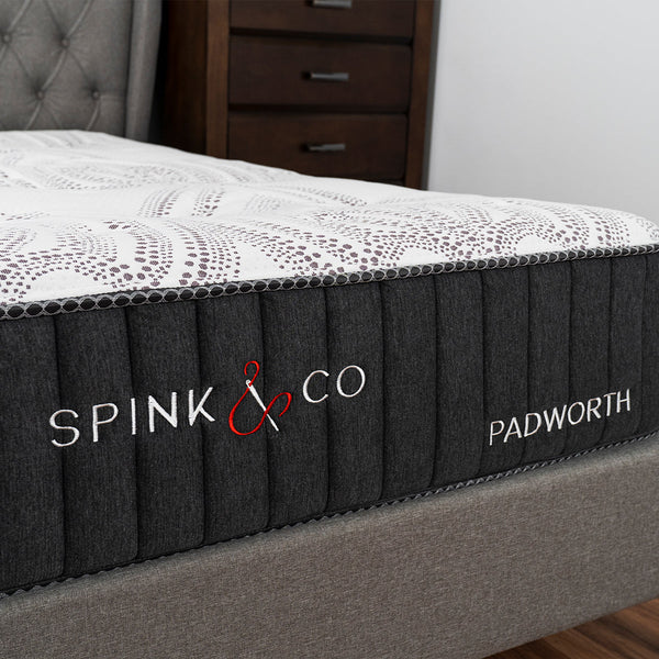 Spink & Co Padworth firm mattress Showing front of the mattress with hand stitched logo and mattress name.