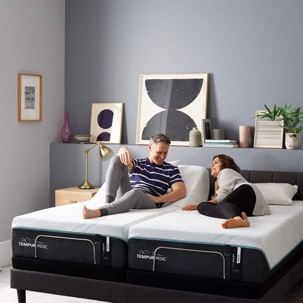 TEMPUR-ProAdapt Medium Mattress Room Shot with Couple Relaxing