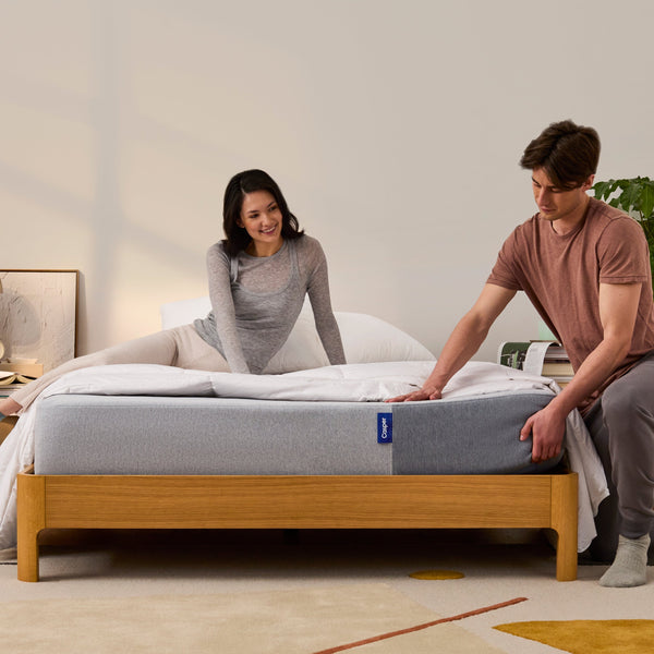 Couple Laying On The Casper Mattress