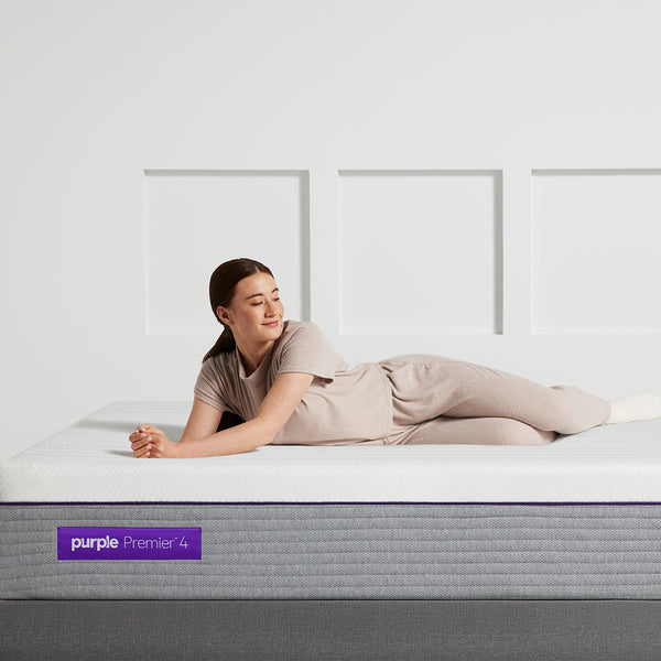 Woman Relaxing On The Purple Hybrid Premier 4 Mattress