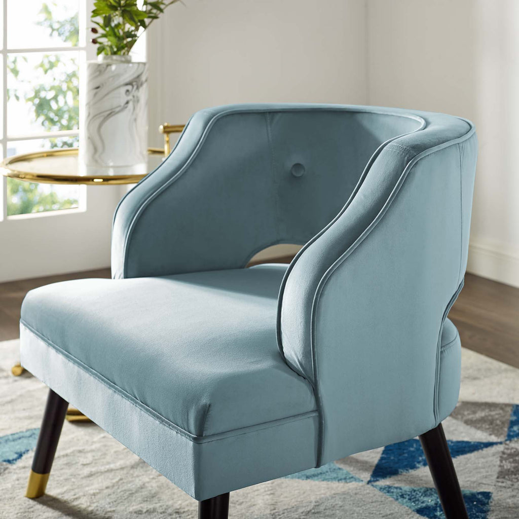 pale blue velvet armchair