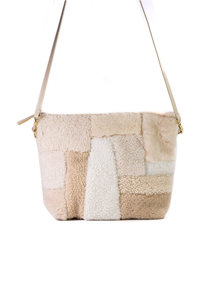 PRIMECUT: OATMEAL SHEARLING SLING BAG