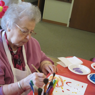 Facilitated painting session with older adults, photo by “Pictures By Ann”