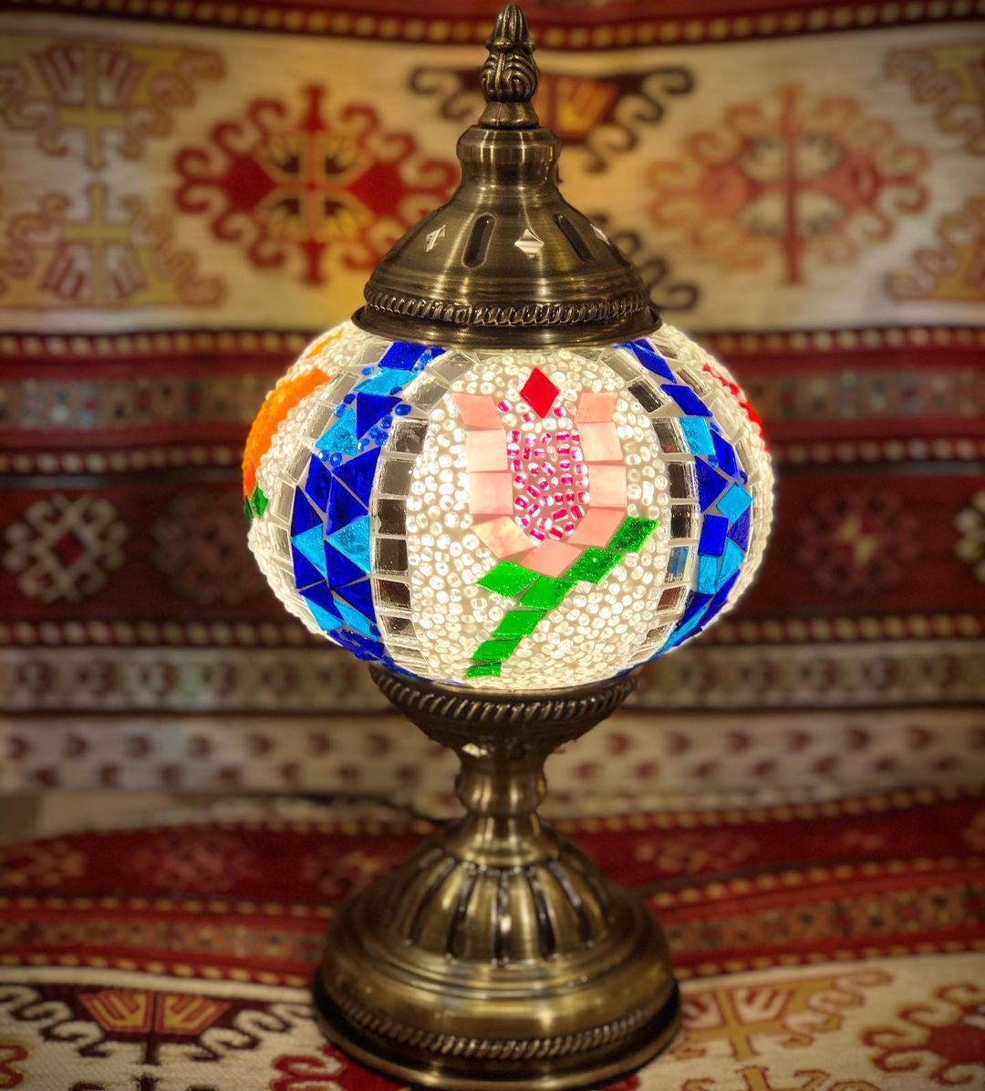 Turkish mosaic lamp with pink tulip pattern on it