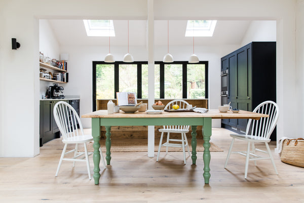 Extendable dining table with green legs