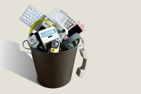 electronic waste disposed of in bin