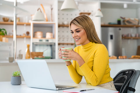 girl sitting at desk with lumbar back support on her chair