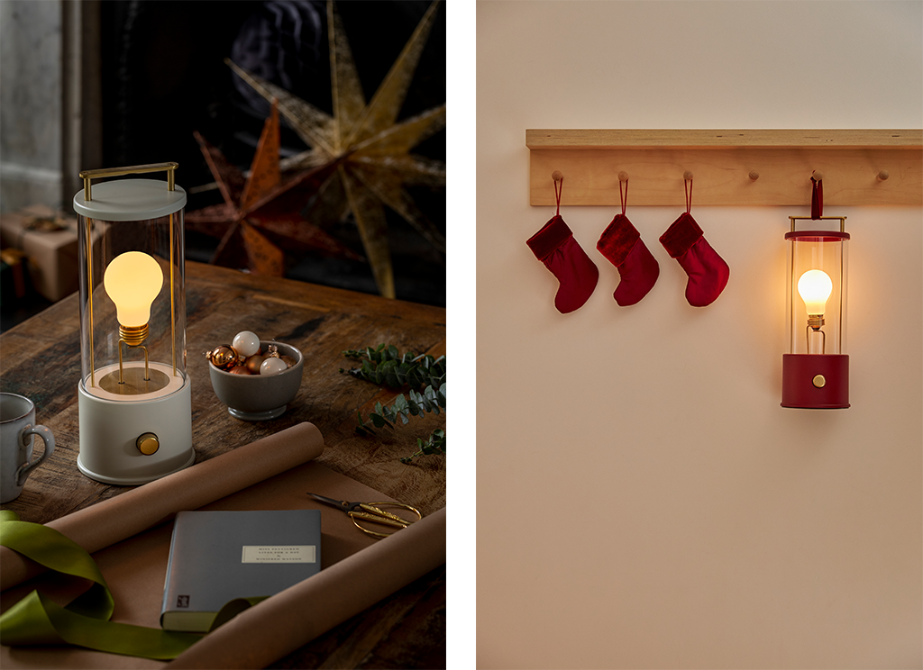 Two images, 1st image displays gift wrapping material with The Muse Table Lamp and the 2nd image shows red stockings hanging from a coat rail and The Muse Table Lamp
