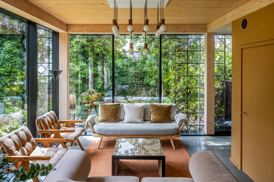 Open plan living space featuring the Sphere III pendant light