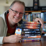 Lee with a stack of his most recent paperback novels.