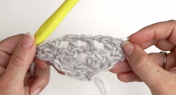 Two types of yarn crocheted together to make a Mesh-pattern