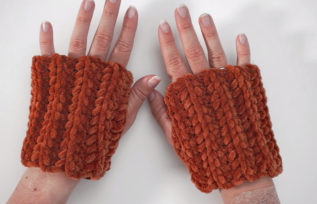 The finished crocheted fingerless gloves