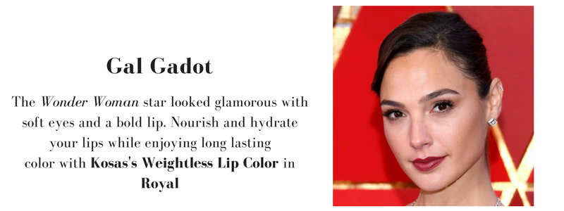 gal gadot wearing soft eyes and a bold lip. to recreate her look, use kosas's weightless lip color in royal